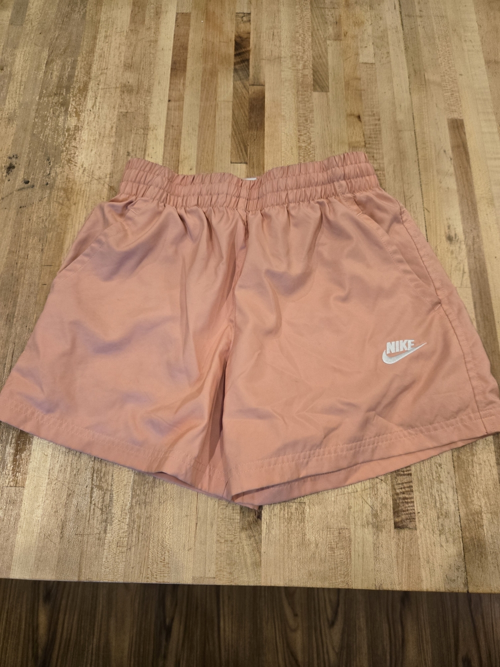 Nike Coral Pink Athletic Shorts with White Logo